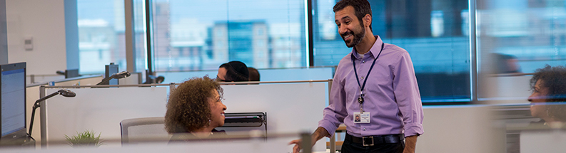 CareFirst associates chatting in Baltimore office