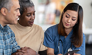 Healthcare worker assisting patients