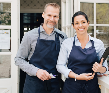 Male and female restaurant owners