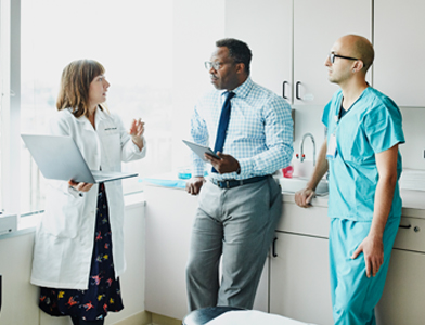 doctors discussing patient