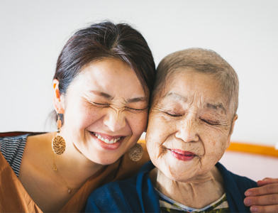 mom and daughter hugging