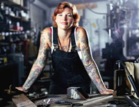Tattoo female in bike shop