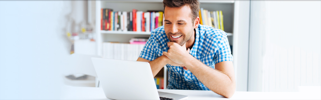 Man using a laptop.